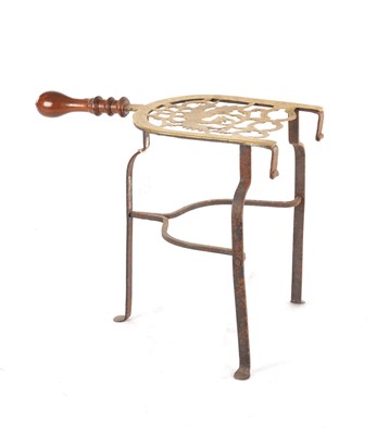 Lot 905 - A GEORGE II BRASS AND IRON TRIVET