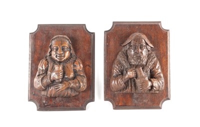 Lot 1094 - A PAIR OF 18TH CENTURY CARVED WALNUT BUSTS