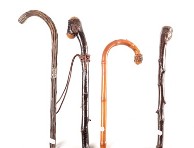 Lot 1060 - A SELECTION OF FOUR HAWTHRONE AND BAMBOO WALKING STICKS