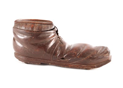 Lot 1155 - A RARE 19TH CENTURY BLACK FOREST CARVED WALNUT MUCIS BOX FORMED AS AN OLD SHOE