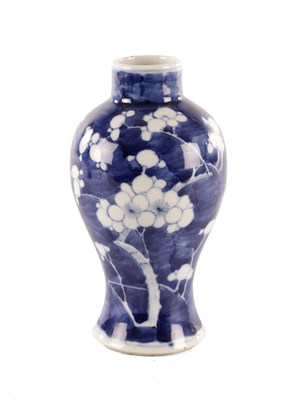 Lot 173 - A CHINESE BLUE AND WHITE PRUNUS VASE