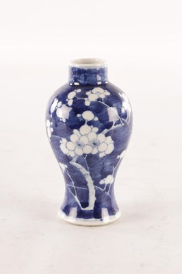 Lot 173 - A CHINESE BLUE AND WHITE PRUNUS VASE