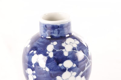 Lot 173 - A CHINESE BLUE AND WHITE PRUNUS VASE