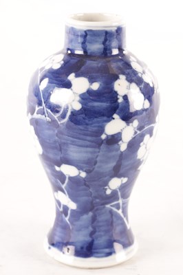 Lot 173 - A CHINESE BLUE AND WHITE PRUNUS VASE