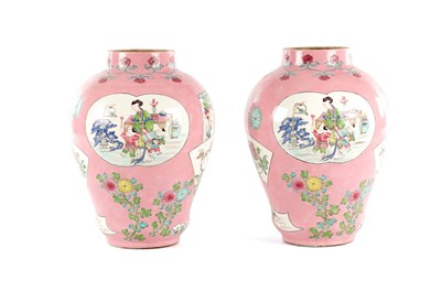Lot 193 - A PAIR OF CHINESE FAMILLE ROSE PINK GROUND BALUSTER VASES
