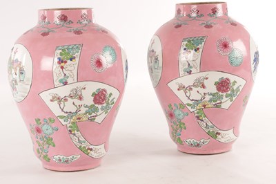 Lot 193 - A PAIR OF CHINESE FAMILLE ROSE PINK GROUND BALUSTER VASES
