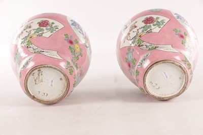 Lot 193 - A PAIR OF CHINESE FAMILLE ROSE PINK GROUND BALUSTER VASES