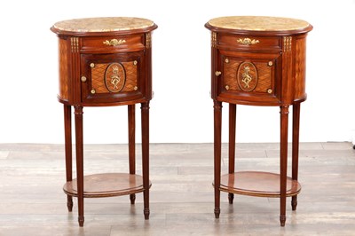 Lot 1288 - A PAIR OF 19TH CENTURY FRENCH INLAID MAHOGANY OVAL SHAPED BEDSIDE CUPBOARDS