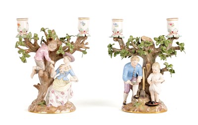 Lot 104 - A pair of late 19th Century Meissen two branch Figural CANDELABRA