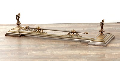 Lot 778 - A 19TH CENTURY STEEL AND BRASS HEARTH FENDER