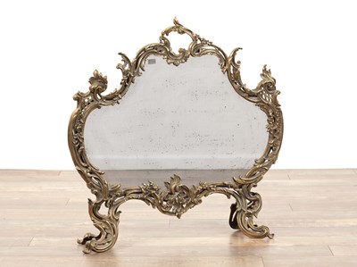 Lot 722 - A 19TH CENTURY ROCOCO STYLE CAST BRASS HEARTH SCREEN