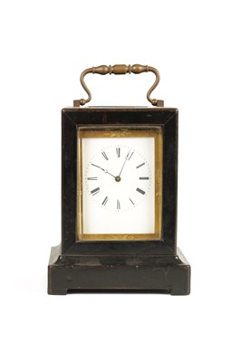 Lot 1545 - A MID 19TH CENTURY FRENCH EBONISED STRIKING CARRIAGE-TYPE MANTEL CLOCK