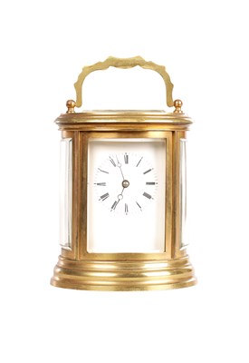 Lot 1752 - A LATE 19TH CENTURY FRENCH OVAL STRIKING CARRIAGE CLOCK