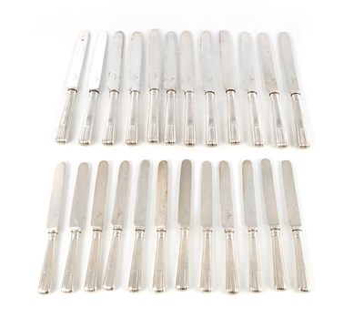 Lot 435 - A VICTORIAN SET OF TWELVE SILVER TABLE AND TWELVE SILVER DESSERT KNIVES