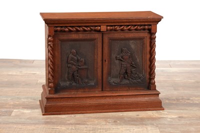 Lot 1299 - A LATE 19TH CENTURY OAK COLLECTOR'S CABINET