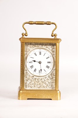 Lot 1465 - A LATE 19TH CENTURY FRENCH ENGRAVED STRIKING CARRIAGE CLOCK