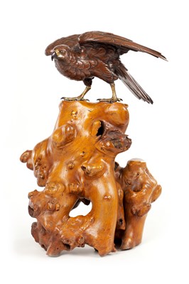 Lot 251 - A LATE 19TH CENTURY JAPANESE MEIJI BRONZE SCULPTURE OF A HAWK ON ROOTWOOD BASE