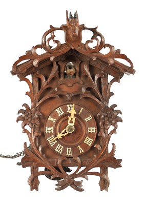 Lot 1350 - A RARE MINIATURE BLACK FOREST JOCLE CUCKOO CLOCK