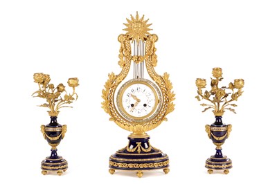 Lot 1723 - A GOOD LATE 19TH CENTURY FRENCH GILT ORMOLU AND ROYAL BLUE PORCELAIN THREE PIECE CLOCK GARNITURE