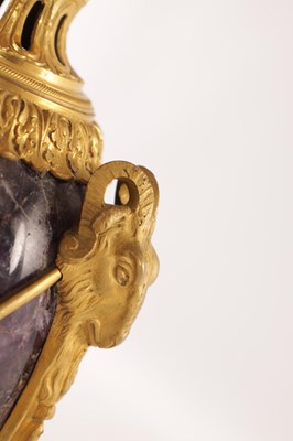 Lot 834 - A FINE PAIR OF LATE GEORGE III ORMOLU AND BLUE JOHN MANTEL URNS/CANDLE HOLDERS ON VEINED PINK MARBLE PEDESTAL BASES ATTRIBUTED TO MATTHEW BOULTON