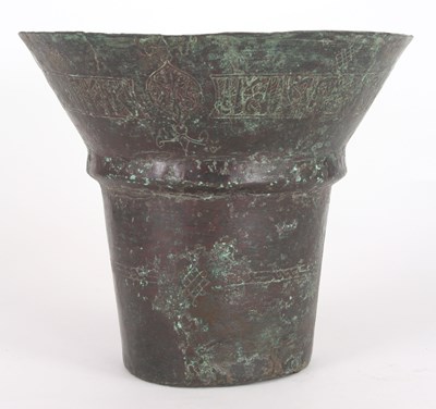 Lot 136 - A 12TH CENTURY KHORASSAN BRONZE MOSQUE LAMP...