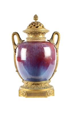 Lot 201 - A 19TH CENTURY ORMOLU MOUNTED CHINESE SANG DE BOEUF VASE