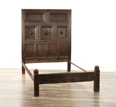 Lot 1191 - A 17TH CENTURY PANELLED OAK FOUR POSTER BED HEADBOARD