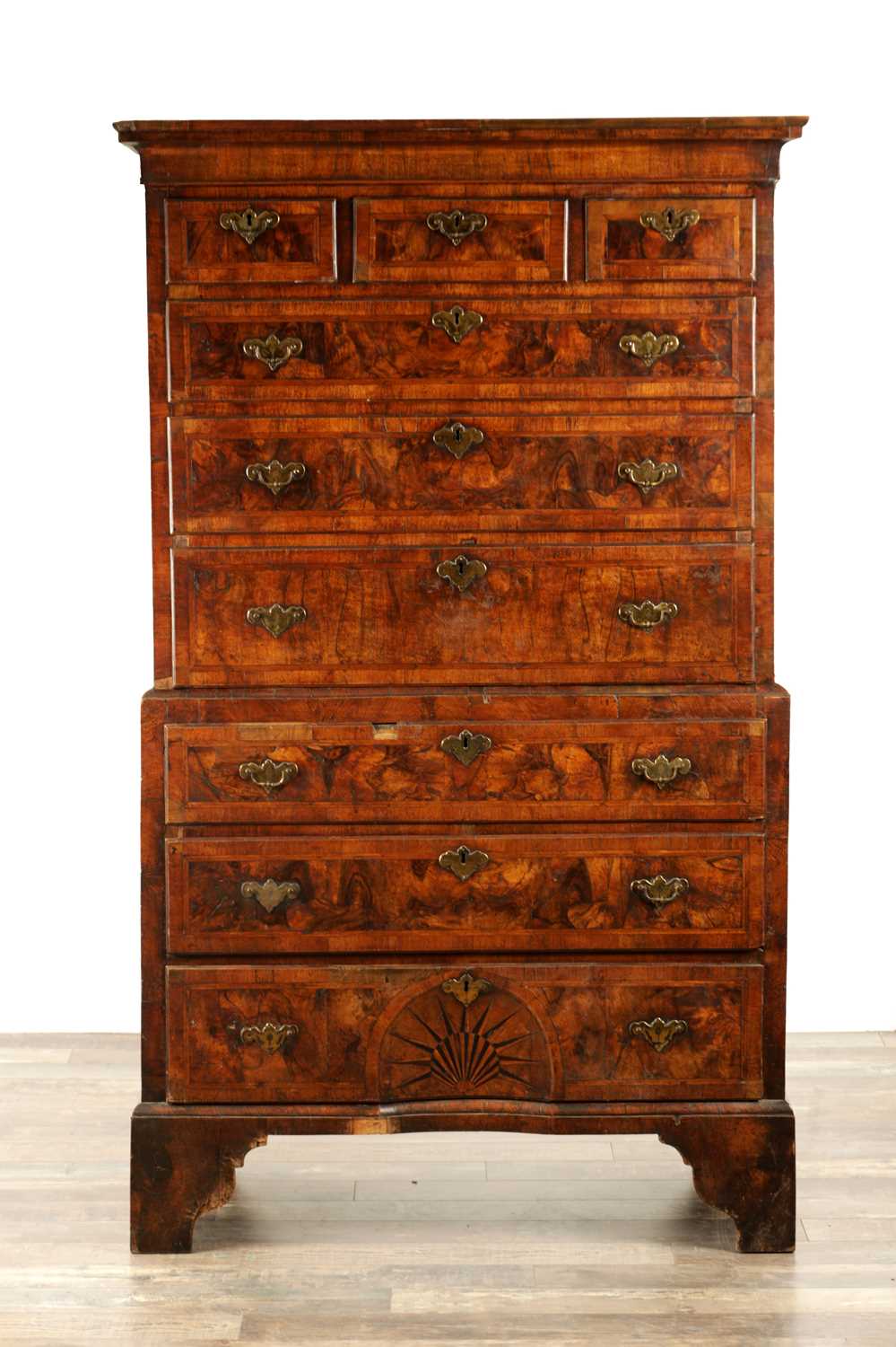 Lot 1238 - A GOOD EARLY 18TH CENTURY FIGURED WALNUT AND HERRING-BANDED CHEST ON CHEST WITH STARBURST BASE