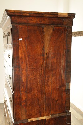 Lot 1238 - A GOOD EARLY 18TH CENTURY FIGURED WALNUT AND HERRING-BANDED CHEST ON CHEST WITH STARBURST BASE