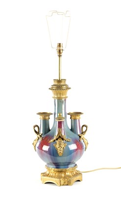 Lot 198 - A 19TH CENTURY CHINESE SANG DE BOEUF ORMOLU MOUNTED TABLE LAMP