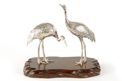 Lot 181 - A PAIR OF JAPANESE MEIJI PERIOD SILVERED BRONZE SCULPTURES OF CRANES