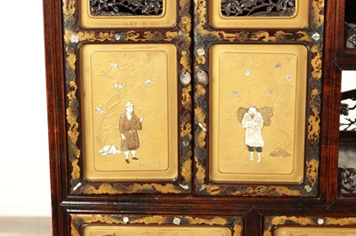 Lot 155 - A FINE 19TH CENTURY JAPANESE CARVED HARDWOOD SHIBIYAMA PANELLED DISPLAY CABINET