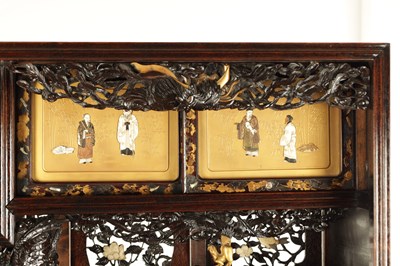 Lot 155 - A FINE 19TH CENTURY JAPANESE CARVED HARDWOOD SHIBIYAMA PANELLED DISPLAY CABINET