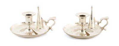 Lot 463 - A PAIR OF QUEEN VICTORIAN CIRCULAR SILVER CHAMBER STICKS