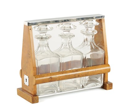 Lot 869 - AN ART DECO BURR ELM AND CHROMIUM THREE BOTTLE DECANTER