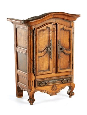 Lot 1138 - AN 18TH CENTURY FRUITWOOD MINIATURE ARMOIRE