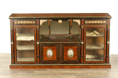 Lot 1211 - A 19TH CENTURY AMBOYNA AND EBONISED SIDE CABINET WITH SERVES PORCELAIN PANELS