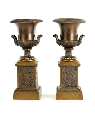 Lot 851 - A PAIR OF LATE 19TH CENTURY BRONZE URNS ON STANDS