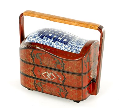 Lot 164 - A CHINESE PORCELAIN AND LACQUERED THREE TIER SANDWICH BOX