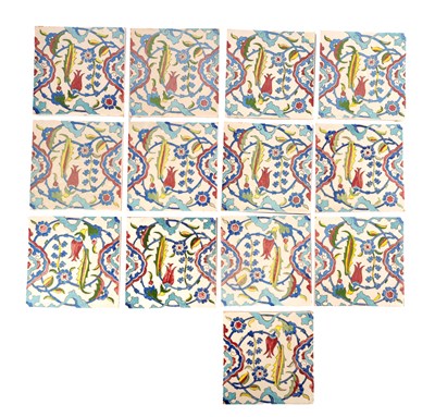 Lot 281 - A SET OF THIRTEEN TURKISH IZNIK HAND PAINTED TERRACOTTA TILES