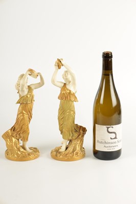 Lot 71 - A PAIR OF LATE 19TH CENTURY BLUSH IVORY ROYAL WORCESTER FIGURES OF MUSICIANS