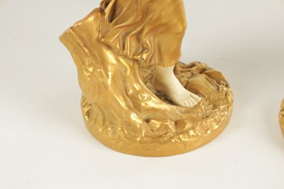 Lot 71 - A PAIR OF LATE 19TH CENTURY BLUSH IVORY ROYAL WORCESTER FIGURES OF MUSICIANS