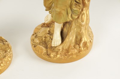 Lot 71 - A PAIR OF LATE 19TH CENTURY BLUSH IVORY ROYAL WORCESTER FIGURES OF MUSICIANS