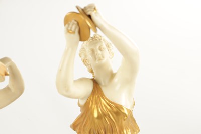 Lot 71 - A PAIR OF LATE 19TH CENTURY BLUSH IVORY ROYAL WORCESTER FIGURES OF MUSICIANS