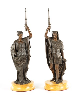 Lot 882 - A PAIR OF EARLY 20TH CENTURY PATINATED BRONZE SCULPTURES