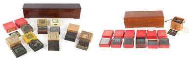 Lot 1767 - A COLLECTION OF SIXTEEN BOXED SETS OF MAGIC LANTERN SLIDES