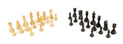 Lot 779 - A CARVED BOXWOOD AND EBONISED CHESS SET