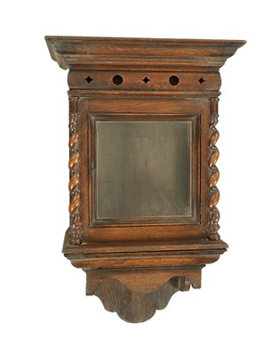 Lot 1676 - AN 18TH CENTURY OAK HOODED WALL CLOCK CASE