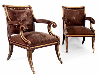 Lot 1270 - A STYLISH PAIR OF REGENCY STYLE PAINTED FAUX ROSEWOOD LIBRARY ARMCHAIRS WITH GILT DECORATION