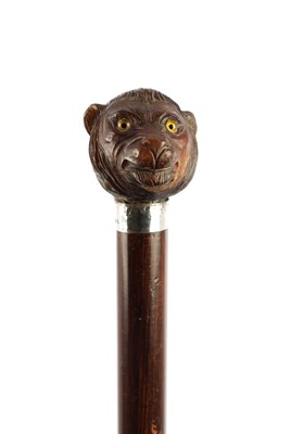 Lot 652 - AN EARLY 20TH CENTURY CARVED HANDLE WALKING STICK